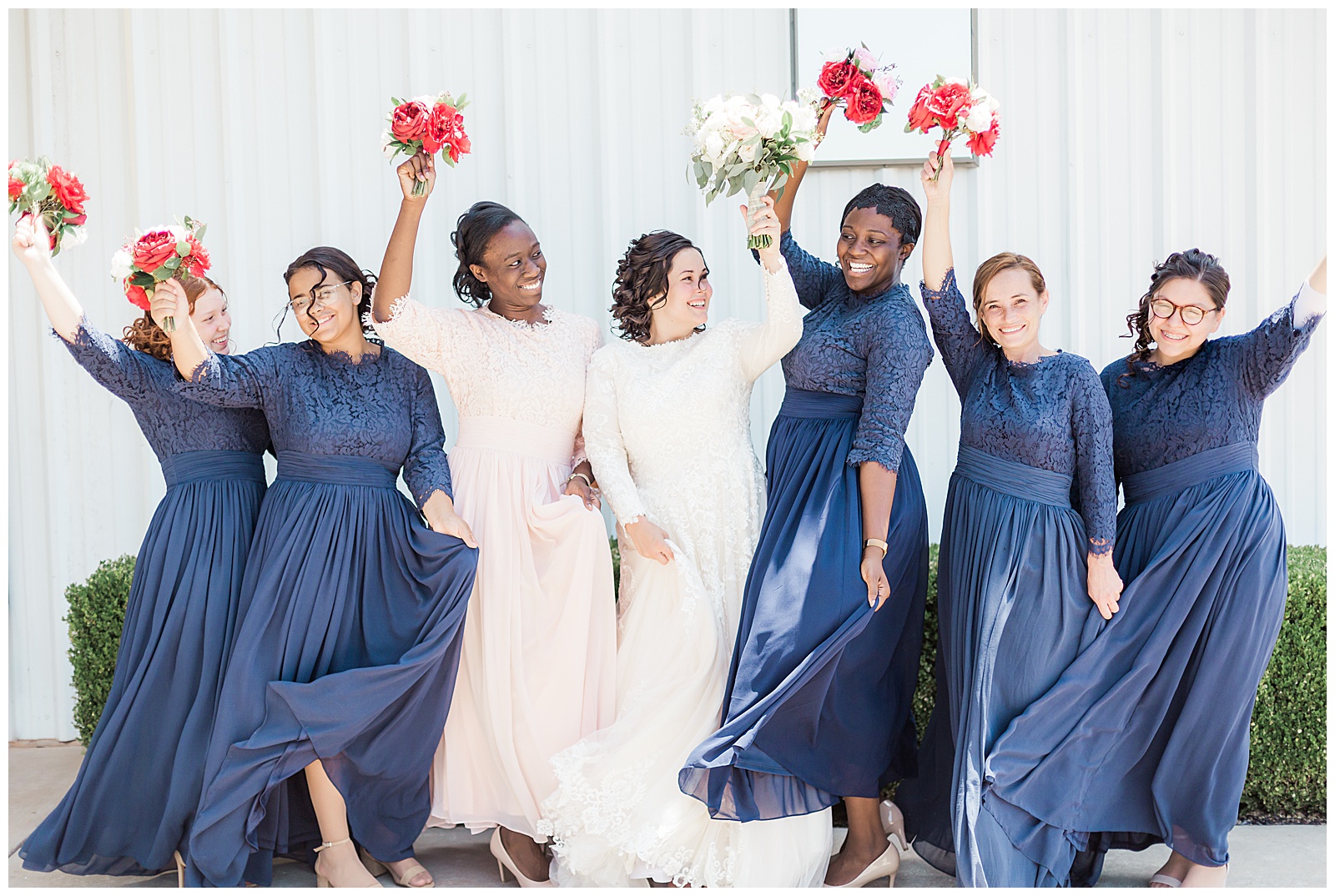 Bridesmaids posing in Dainty Jewell's dresses