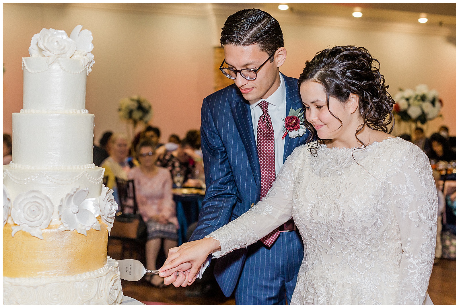 Bride and Groom cutting cake