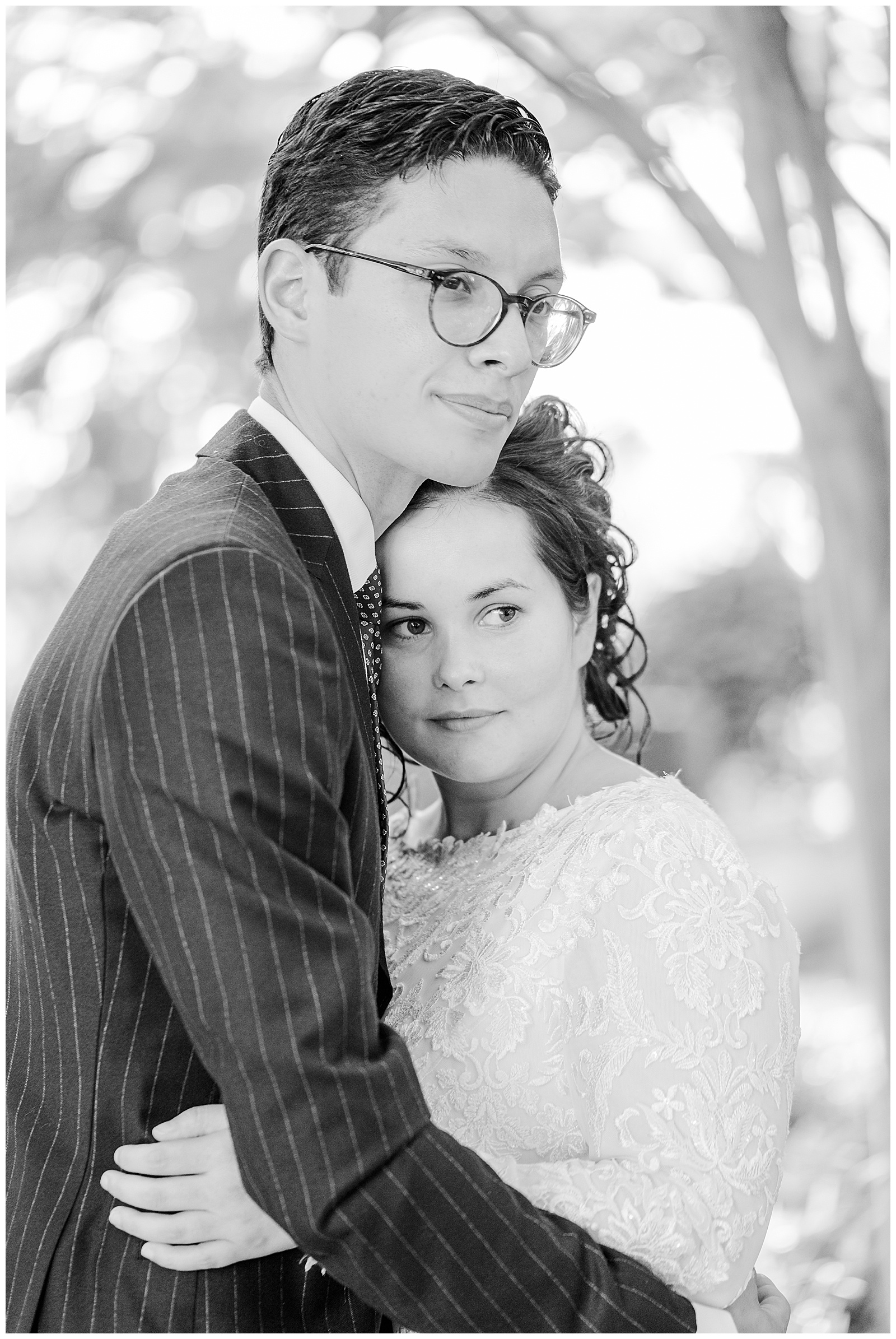 Bride and groom pose in Oklahoma City park