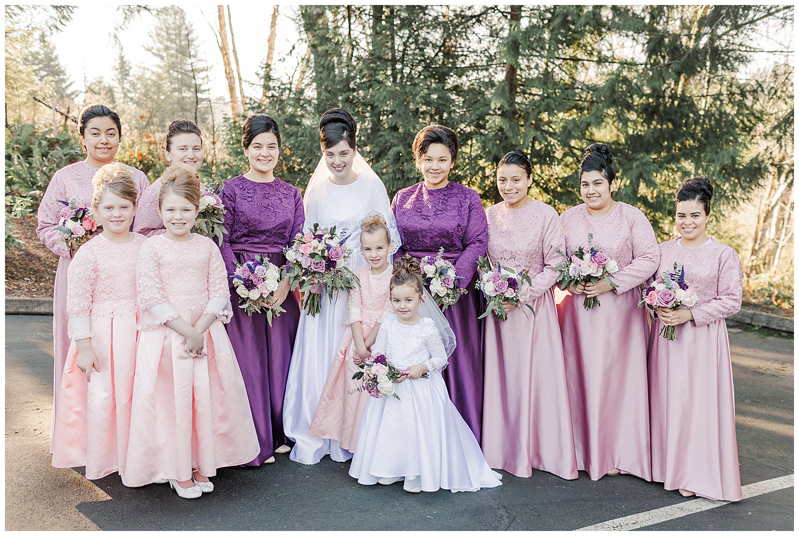 Bride with bridesmaids and flower girls