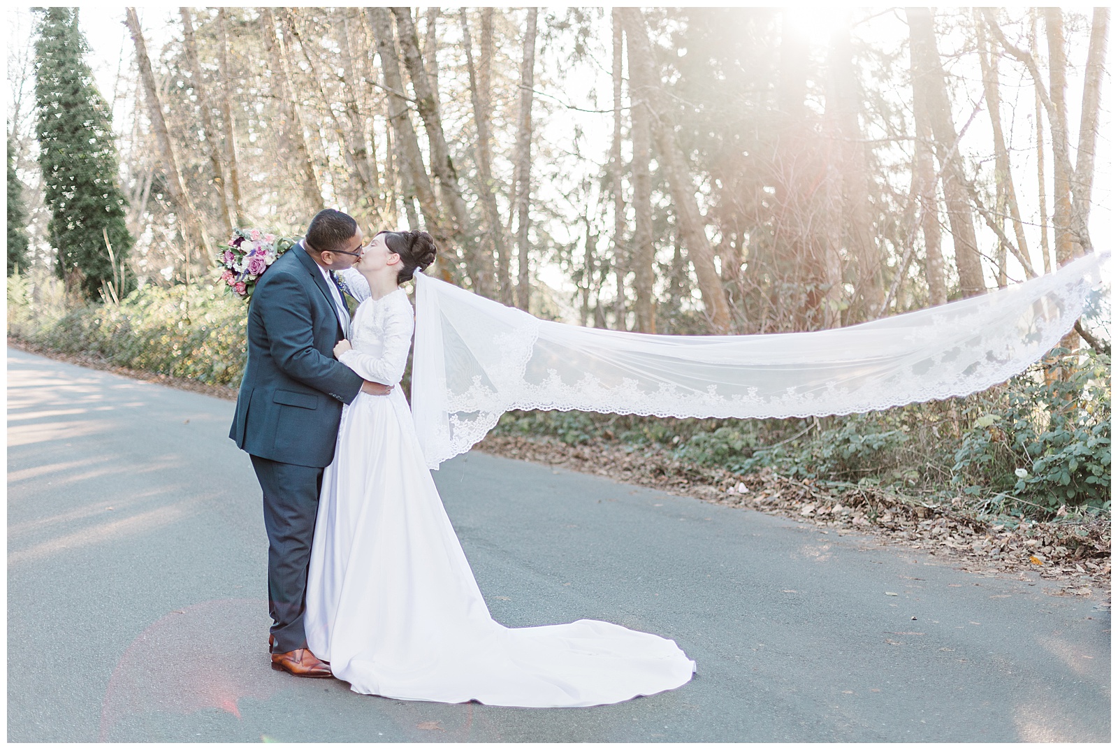 Veil shot of bride and groom, Apostolic Seattle, WA Wedding