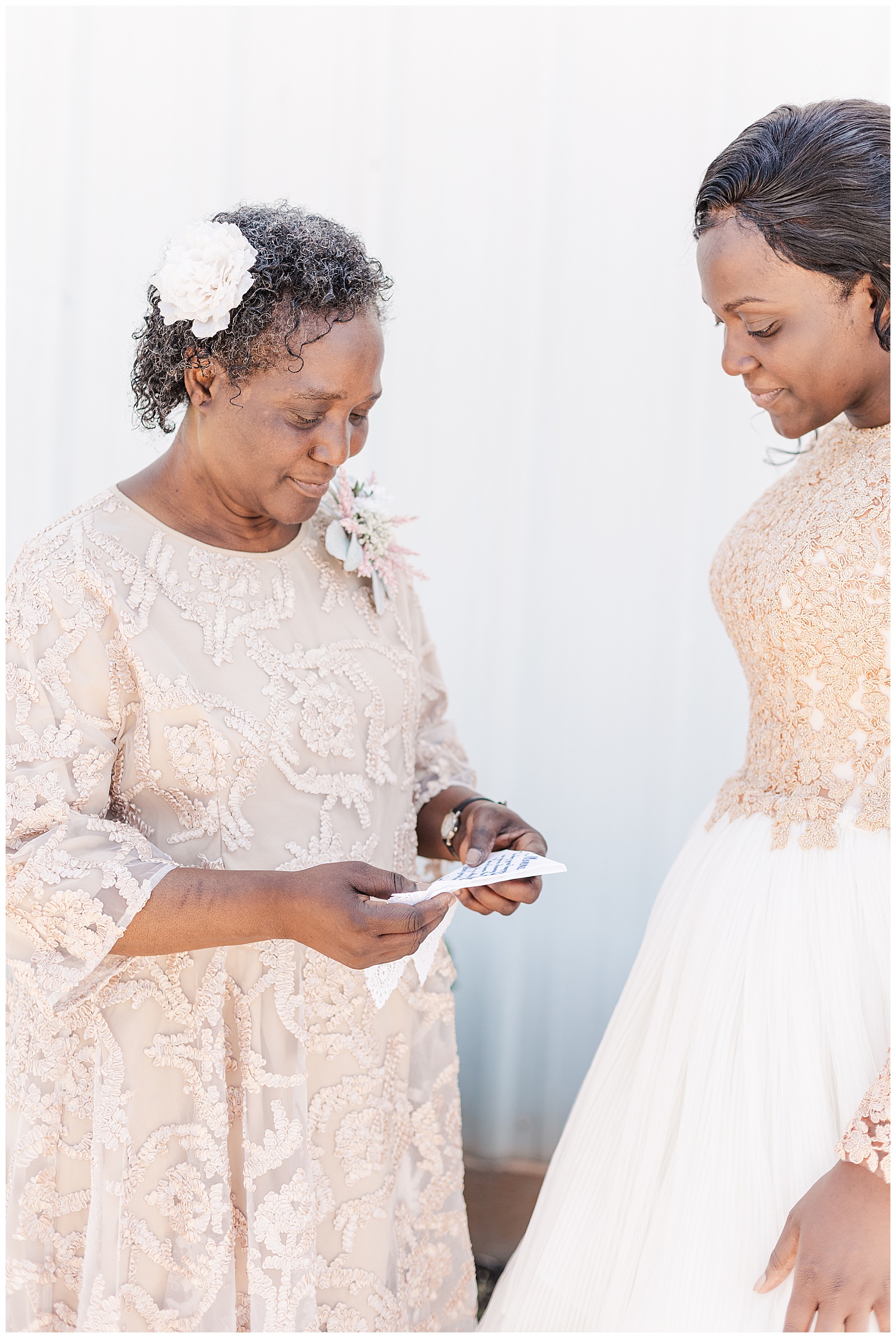 Bride gifting mom with handkerchief